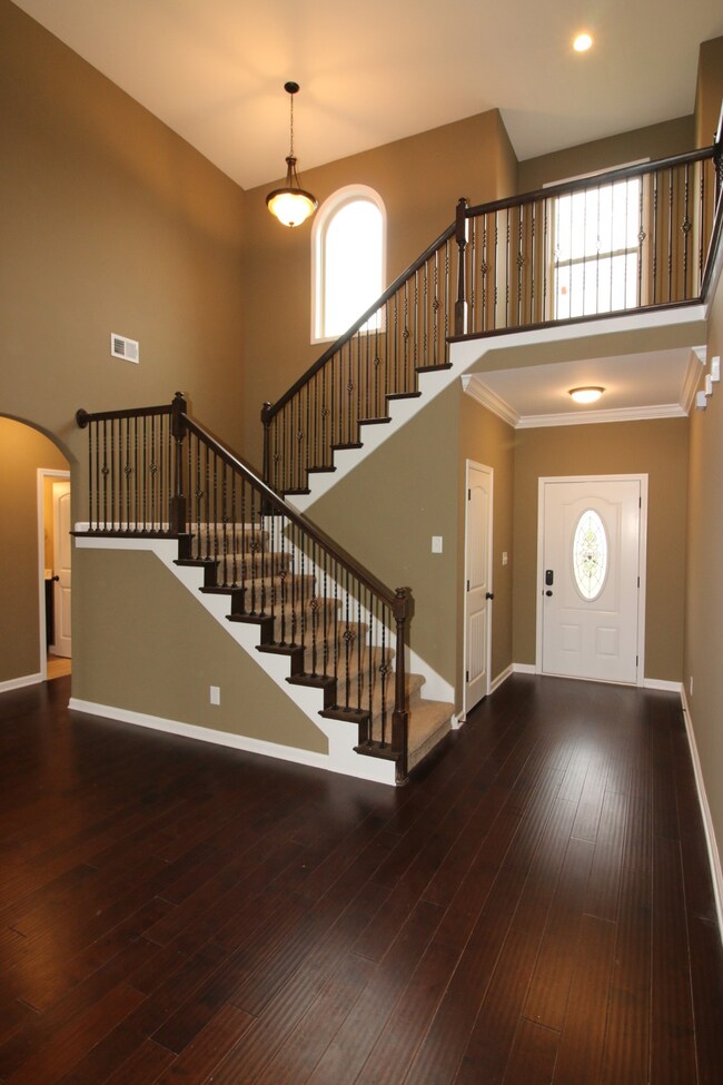 EXAMPLE>>>Beautiful Foyer with an Elegant Staircase and an OVERLOOK!!!