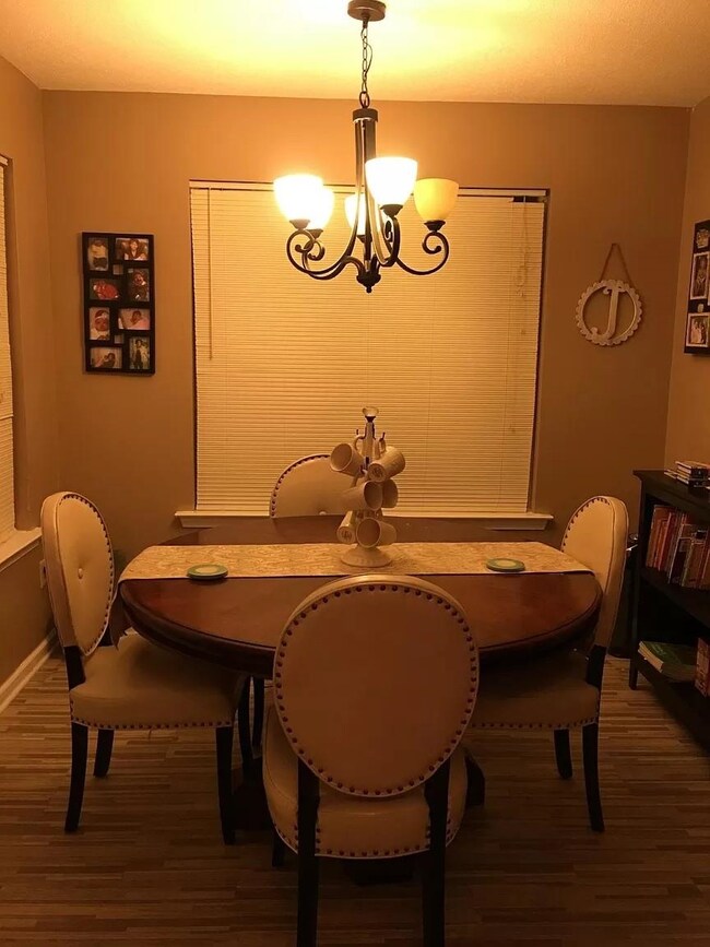 Dining room featuring dark hardwood / wood-style f