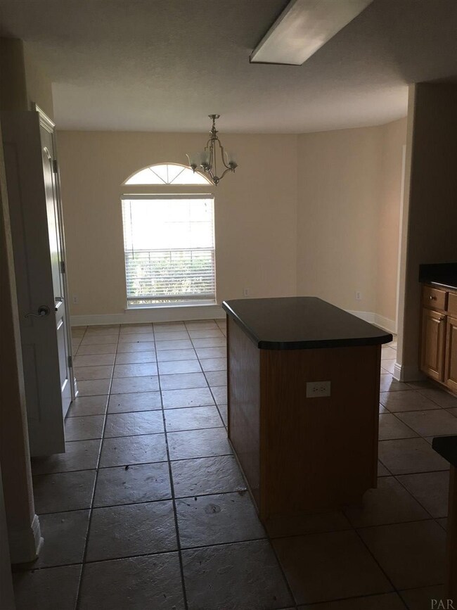 Kitchen features an island for added work space.