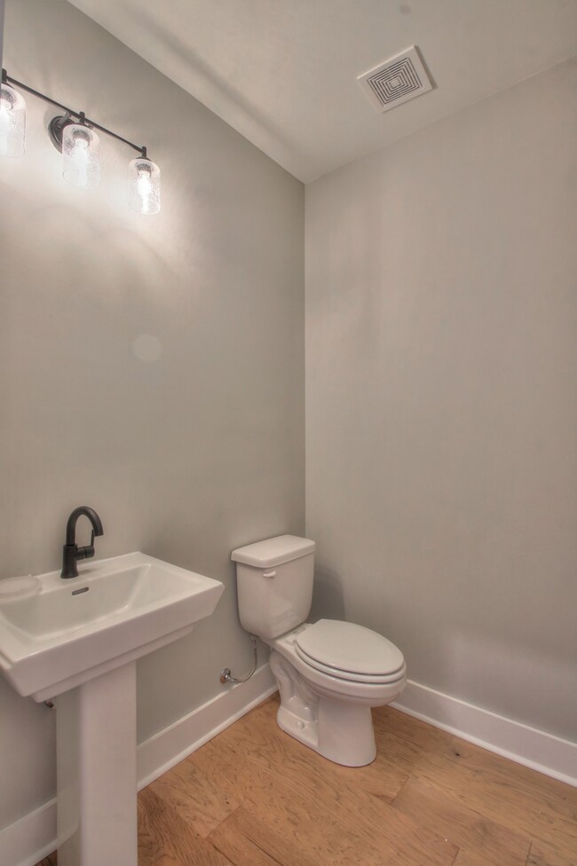 Photos are of a finished Styles plan on another lot. All upgraded options may not be included in this home. Half bath on the main level.