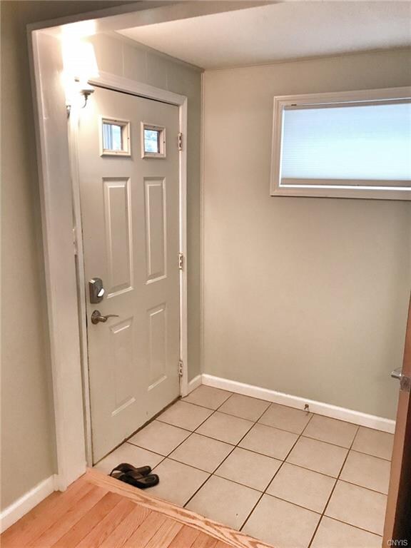 Front entryway features new tile and an oversized 