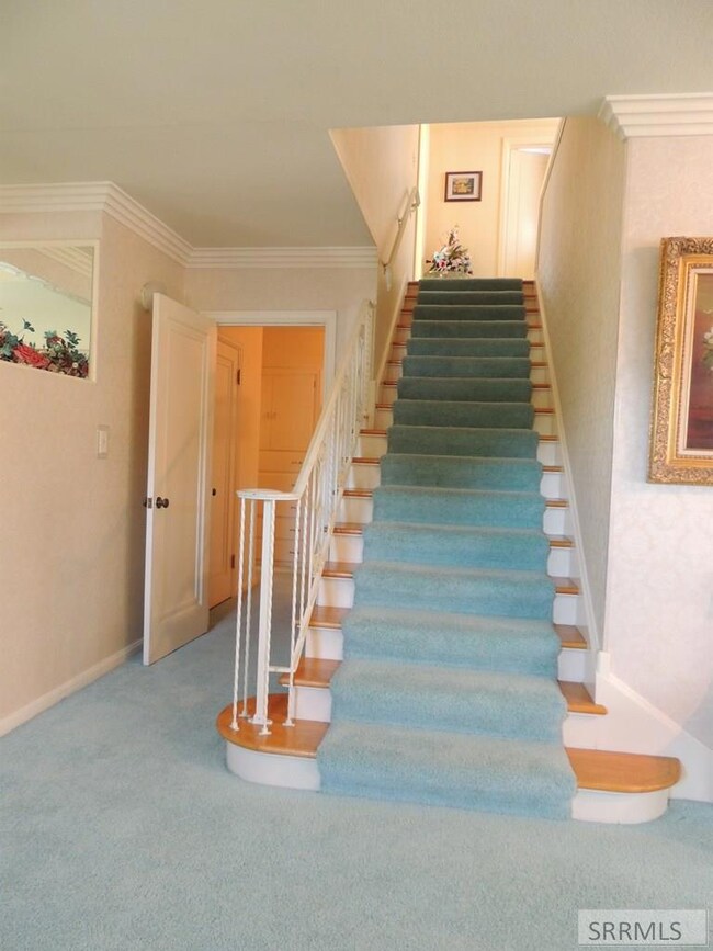 Elegant stairs to upper level