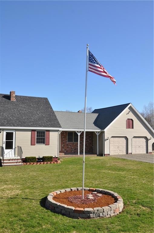 Flag Pole in the Front Yard