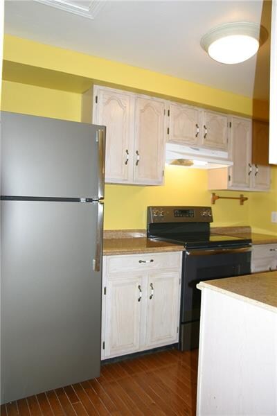A wonderful Kitchen featuring a new Refrigerator, 