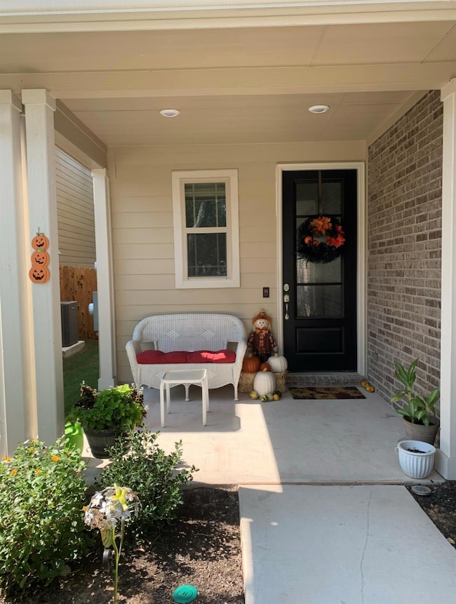 Entrance to property with a porch