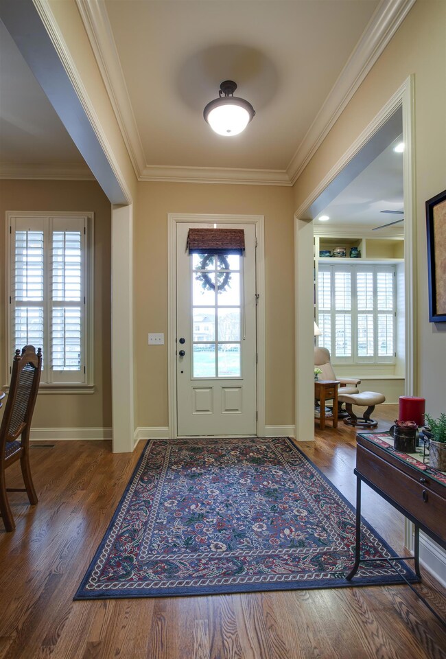 You will love the tall ceilings. In fact, 10' ceilings downstairs (some are 11') all with 8' doors and openings! 
