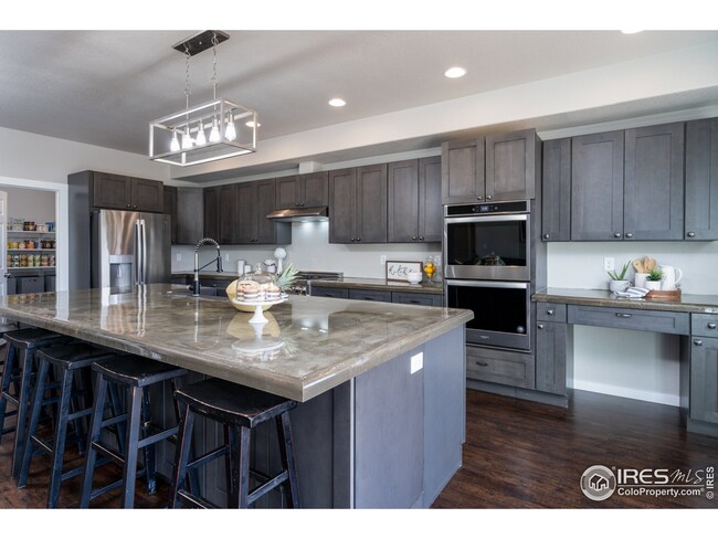 Kitchen with a view into the Pantry.