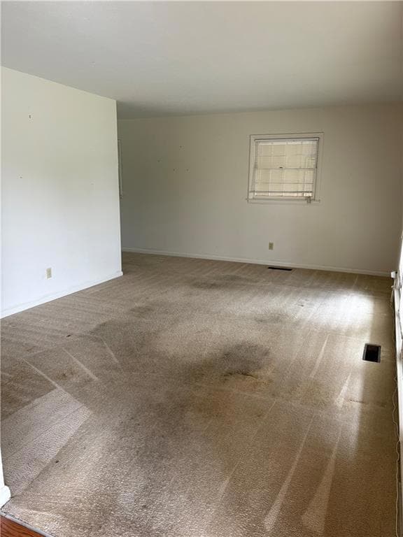 Living room with large window to the right (not pictured)