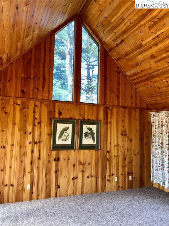 Beautiful woodwork and cathedral ceiling in master