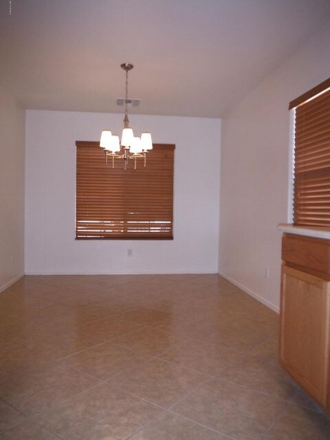 New dining fixture, blinds and tile
