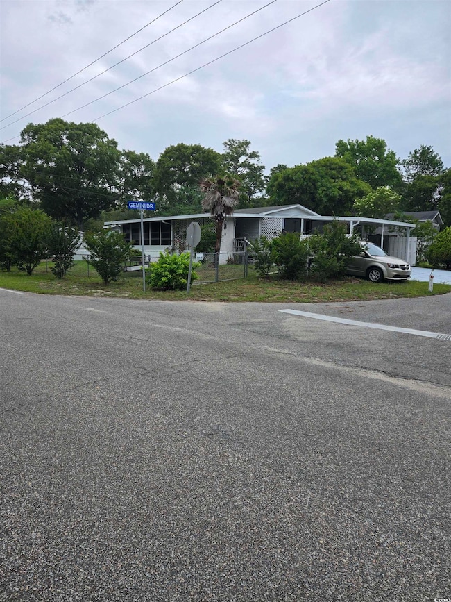 View of front of property with a fenced front yard