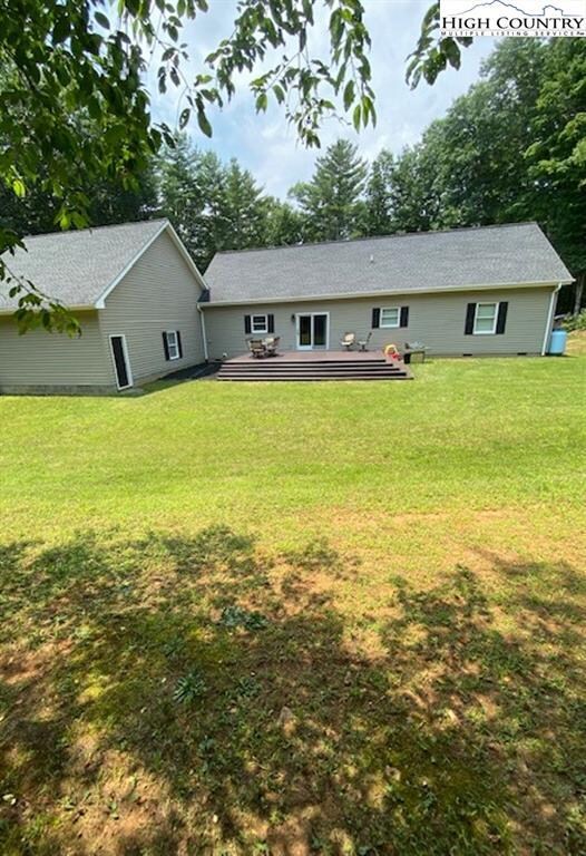 The open deck at the back of this home offers grea