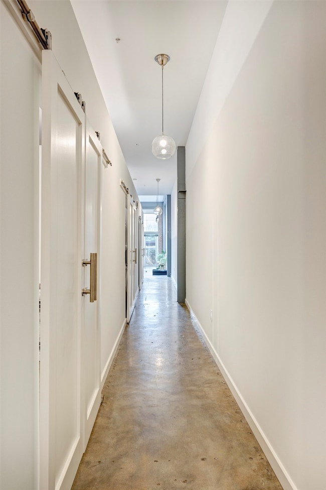 Bright and spacious hallway featuring modern penda