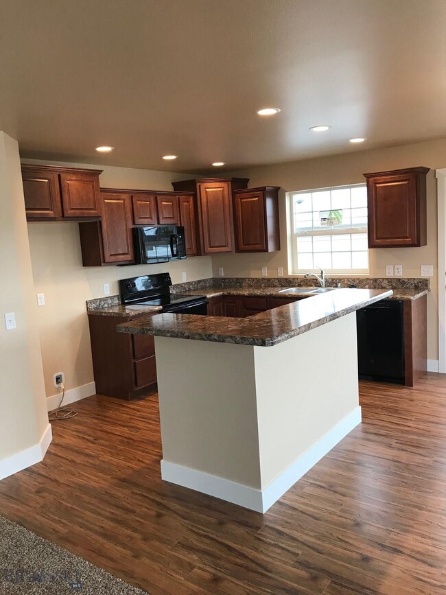 Kitchen. Photo of similar home.