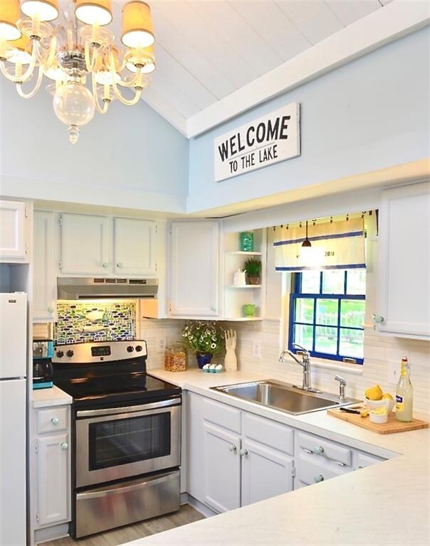 This charming kitchen cathedral shipplaped ceiling