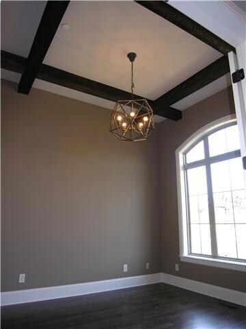 Cedar, criss cross beams, in study.