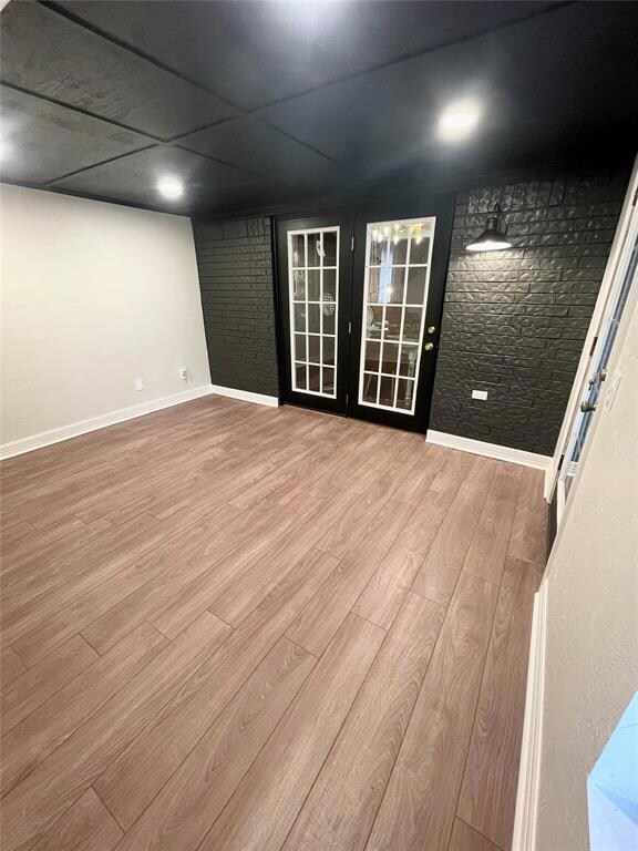 Unfurnished room with light wood-type flooring and