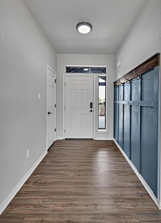 Foyer entrance and mud wall.