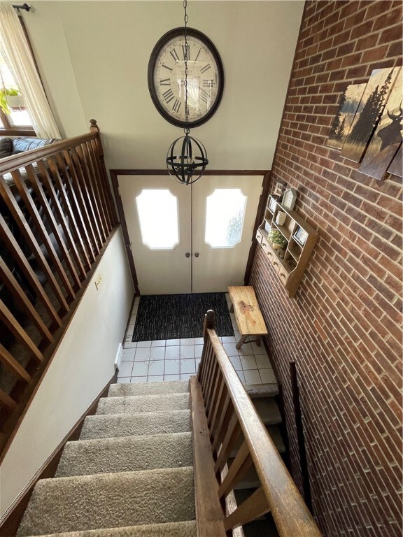 The home is a split entry.  Entry way has a brick