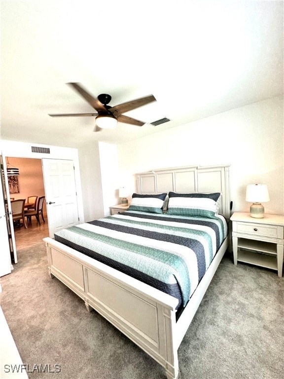 Bedroom featuring carpet and ceiling fan