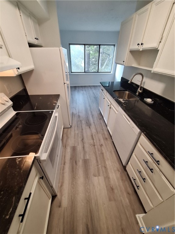 Kitchen has white cabinetry, new white appliances, new wood-style floors, dishwasher, and NEW granite countertops