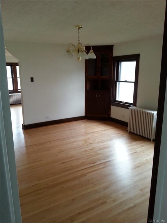 Beautiful refurbished H/W floors in formal dining 