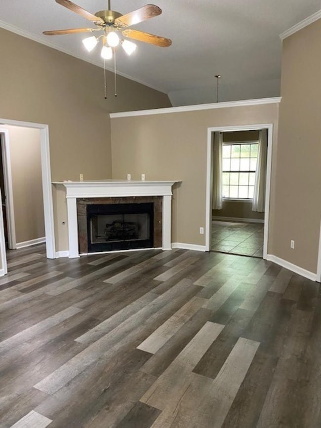 Tall ceilings open to the Dining room!  No carpet! Tile floors and new LVP flooring in 2021.  Corner gas log fireplace!