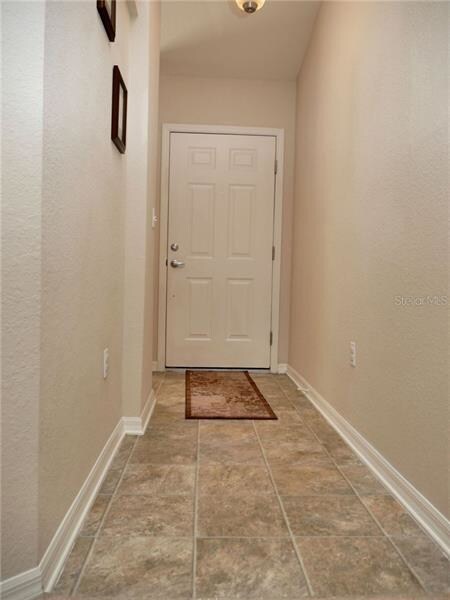 Elongated bright foyer entryway