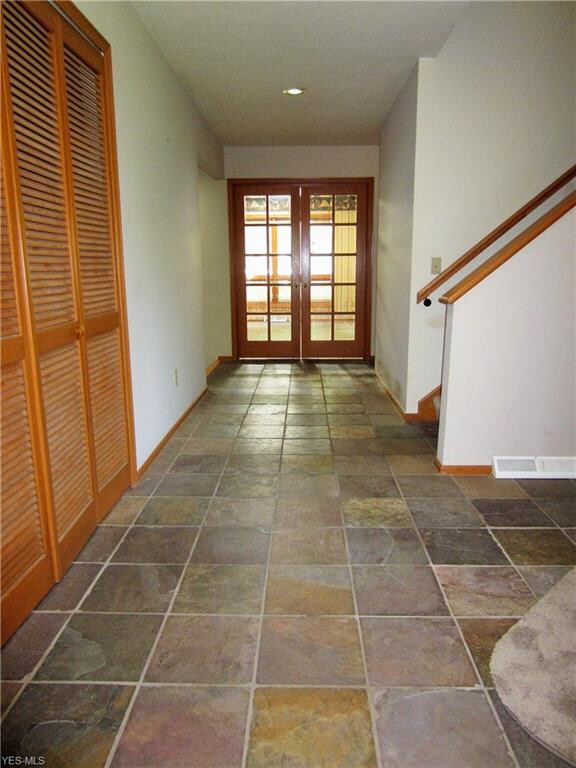 Beautiful entry way showcasing the slate tile floo