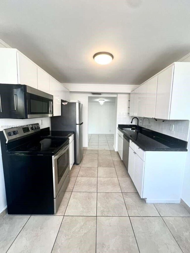 100 Golden Isles Dr unit 406, Hallandale Beach, FL 33009 - photo 4