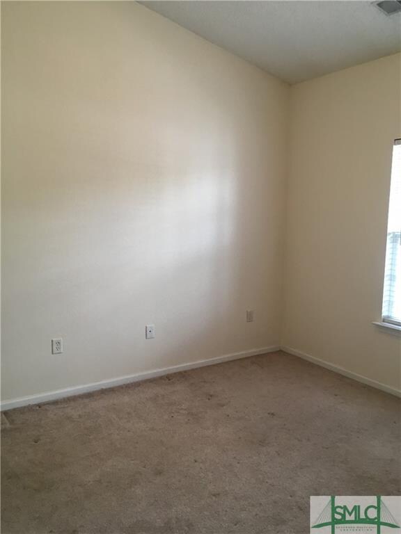 Netral Paint and Vaulted Ceiling in this Bedroom