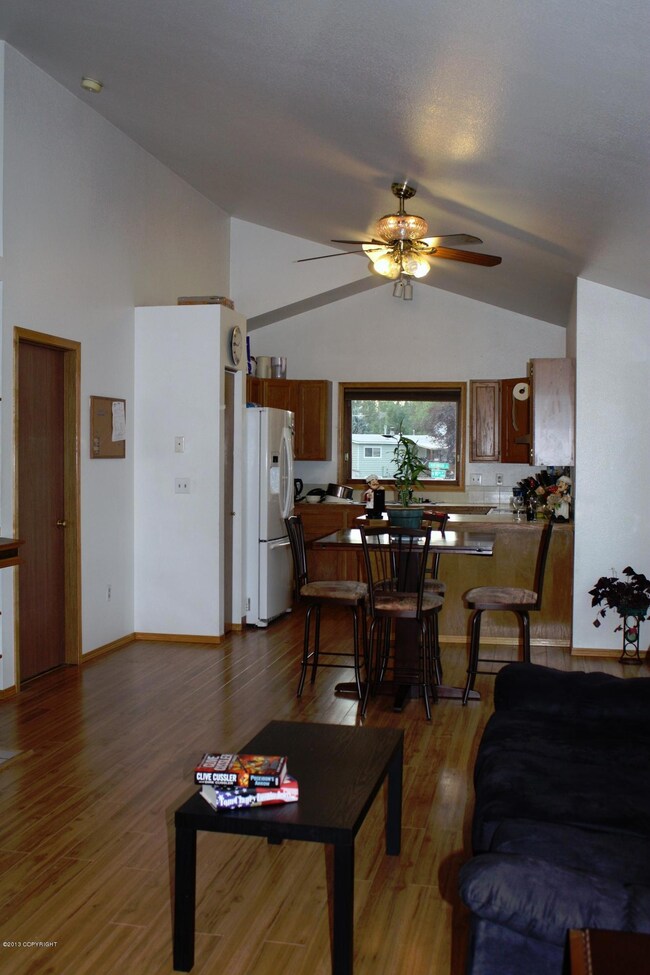 Living room, dining area and kitchen