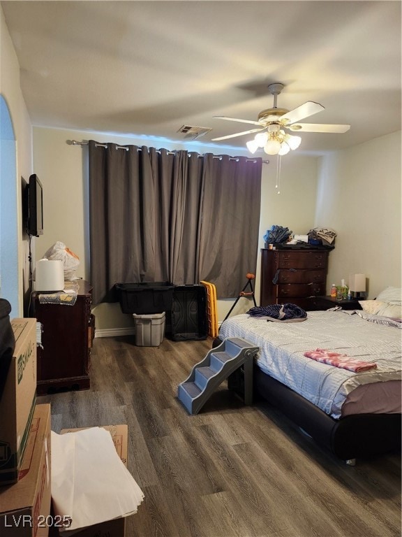 Bedroom featuring wood finished floors and ceiling