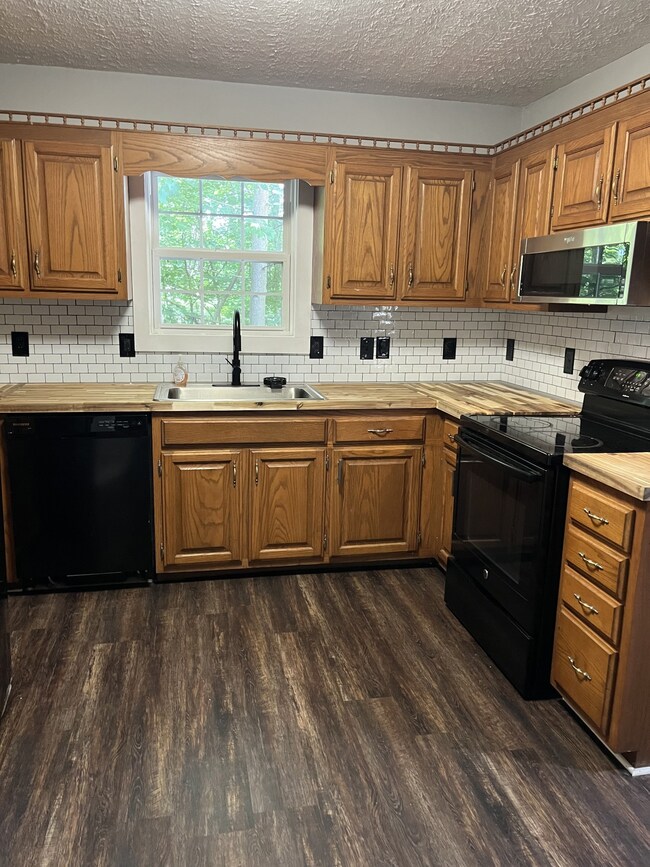 Kitchen window looks out into nature