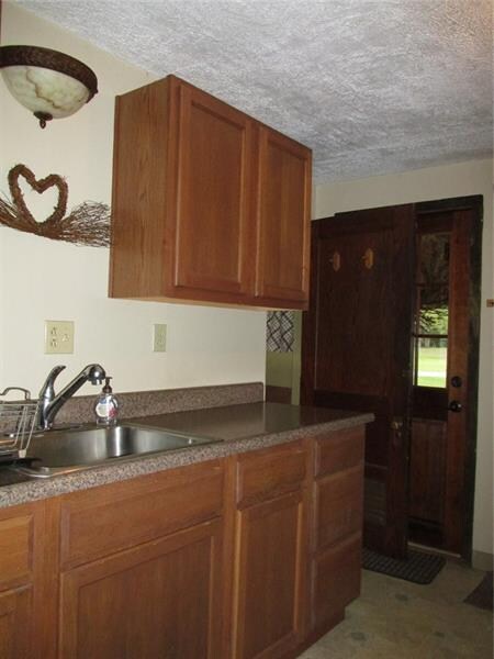 To the back left is the full bath room.