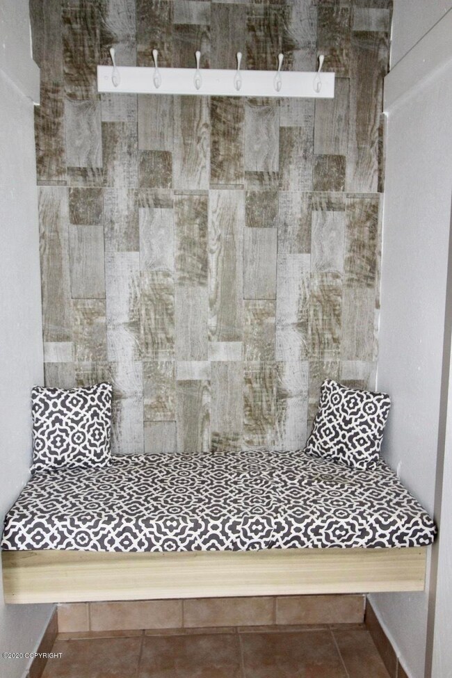 Custom built-in bench and jacket rack