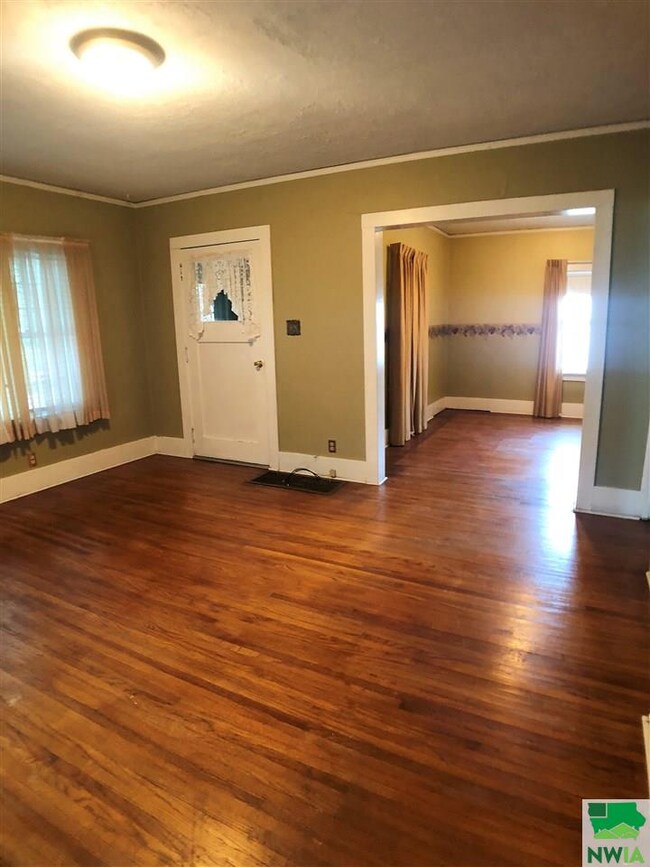 Living space is open to the dining area.