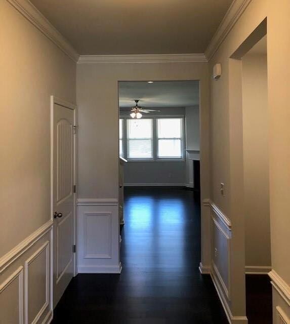 Enter to wains coating and crown molding in foyer Actual home