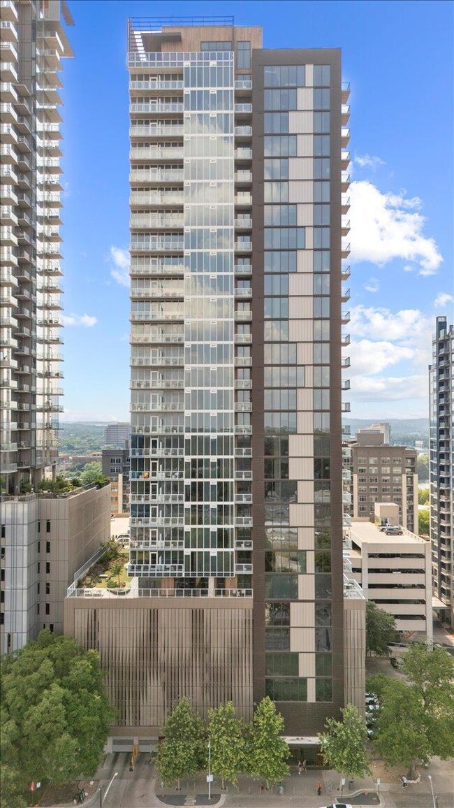 View of building exterior featuring a view of city