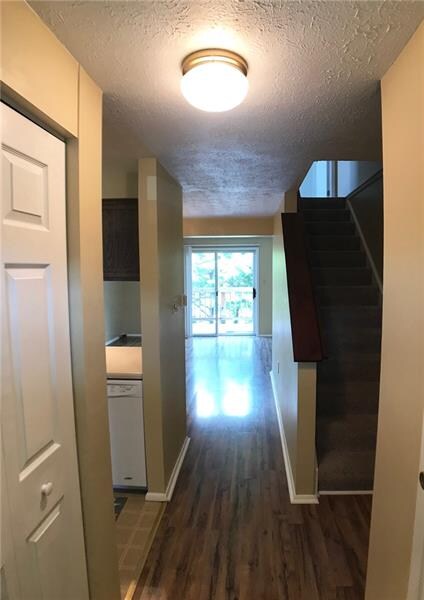 View from inside the front door.  Coat closet to t