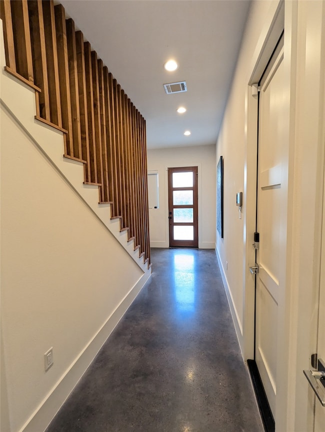 VIEW OF THE FRONT DOOR FROM THE PRIMARY