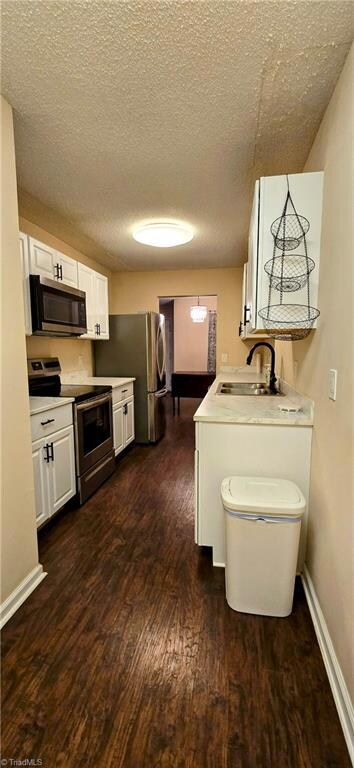Add'l view of kitchen - enough room for a small breakfast table or interesting furniture piece for pantry