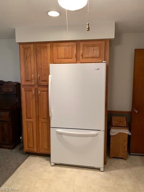Pantry cabinets with roll out shelving.