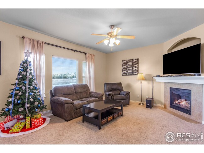 Living room offers a gas fireplace for cozy nights.