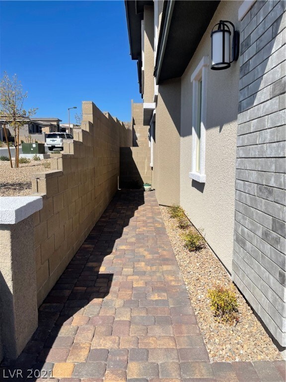 Walkway to front door is also pavers