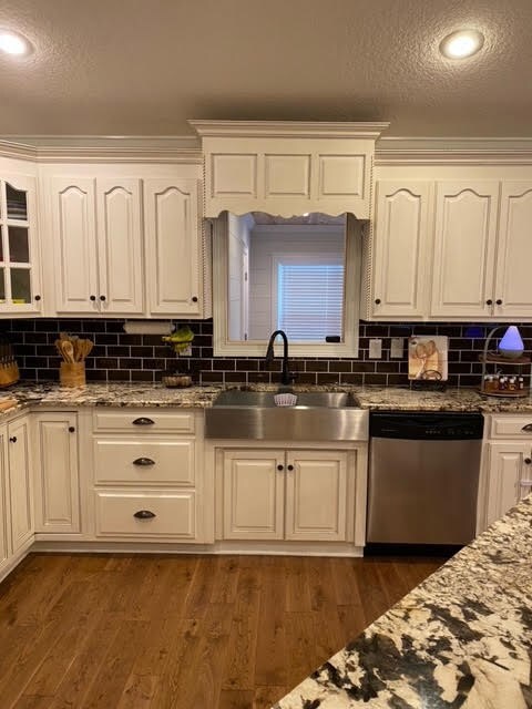Above Kitchen Sink is a Peep Hole to the Playroom