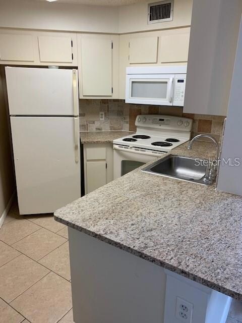 kitchen with breakfast counter