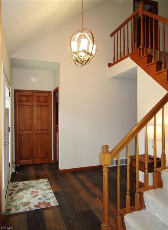 Foyer with staircase to 2nd floor and full bath by