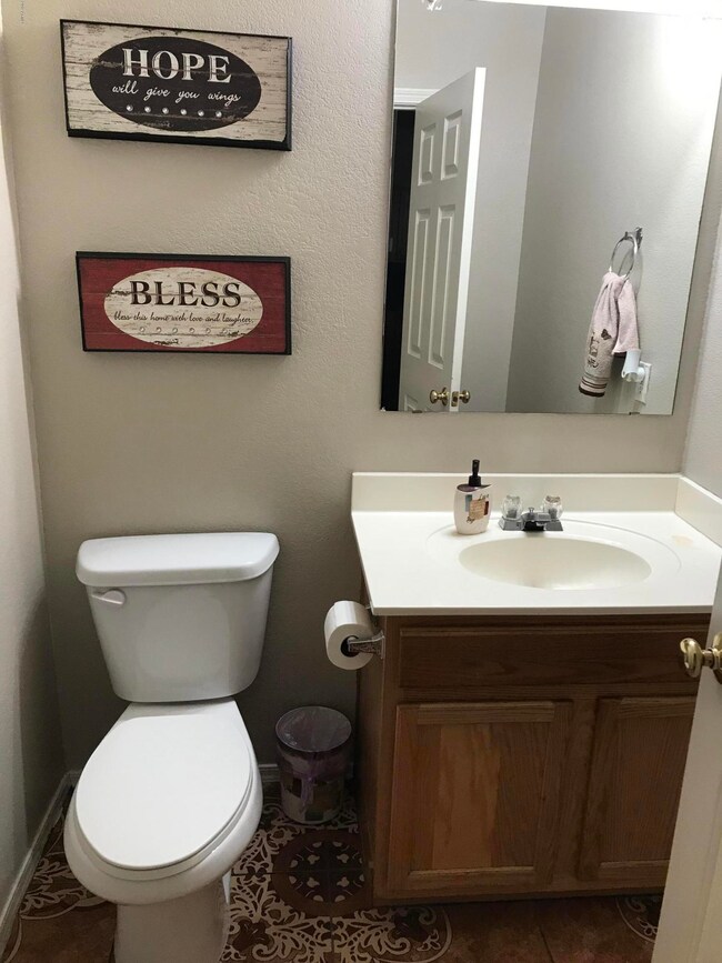 6514 W Miami St downstairs half bath