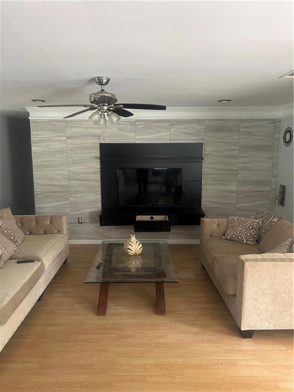 Living room featuring ornamental molding, ceiling 